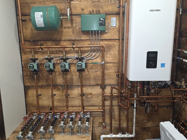 Mechanical room piping and wall-mounted heating equipment
